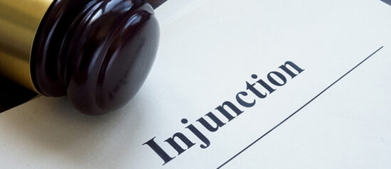 Documents about injunction and gavel.